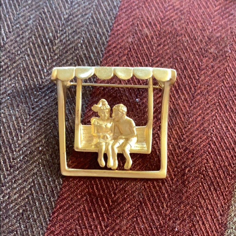 Vintage ajc boy and girl on swing golden